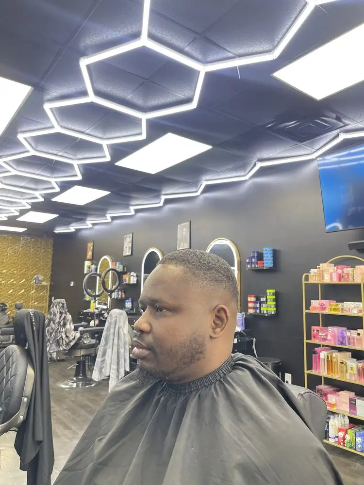 A client's fresh fade and lineup in the shop