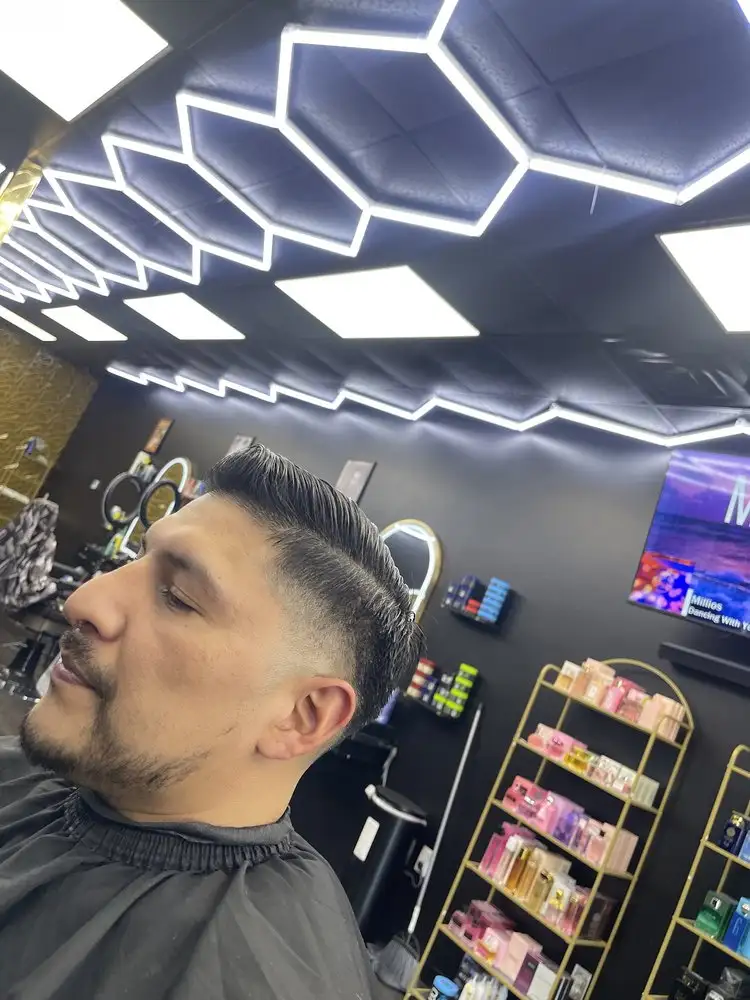 A low fade with a styled top, side view