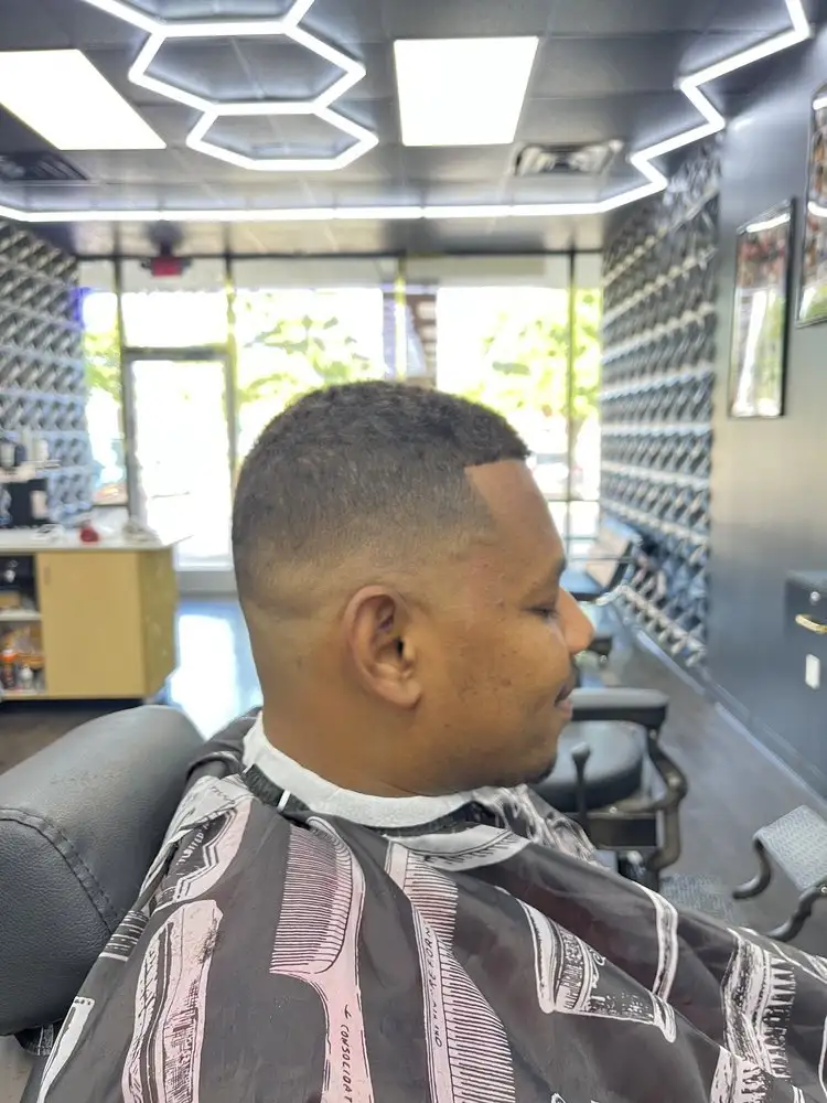 A fade with a sharp lineup, side view