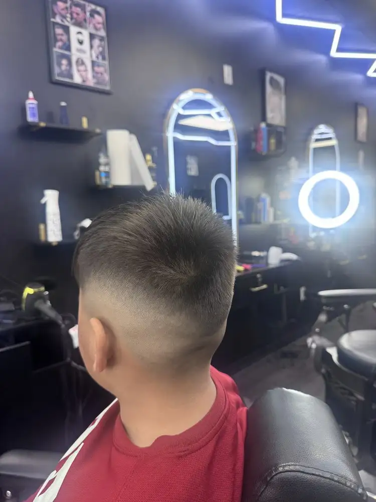 A child's skin fade, seen from behind